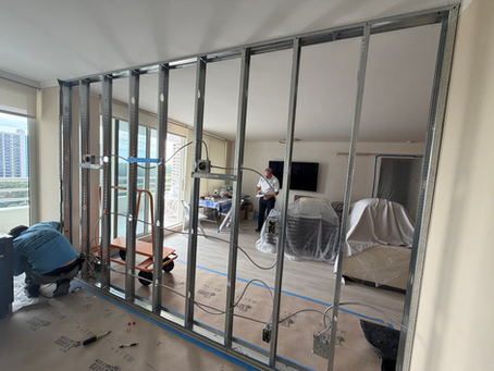 workers doing construction in a condo