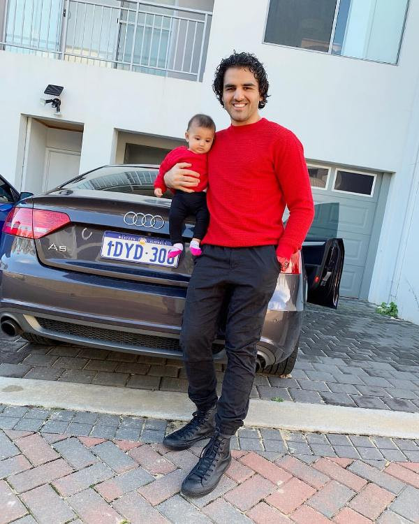 Yusof Mutahar with His Daughter and Car