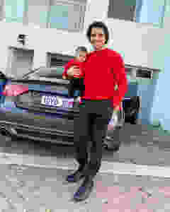 Yusof Mutahar with His Daughter and Car