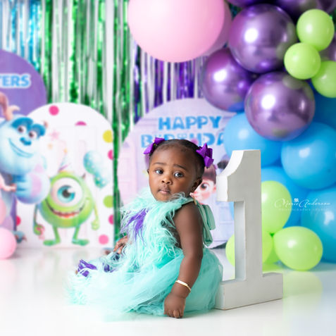 best photographer in new orleans on the westbank norie anderson photography studio elmo theme monsters theme diner theme marrero harvey gretna nola kid photographer black female children's first birthday cake smash session