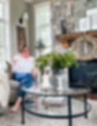 Women sitting in living room on white chair