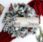 Merry Country Christmas wreath with red and white decorations, cottonseed pods, berries, pine branches, and black checker bow.