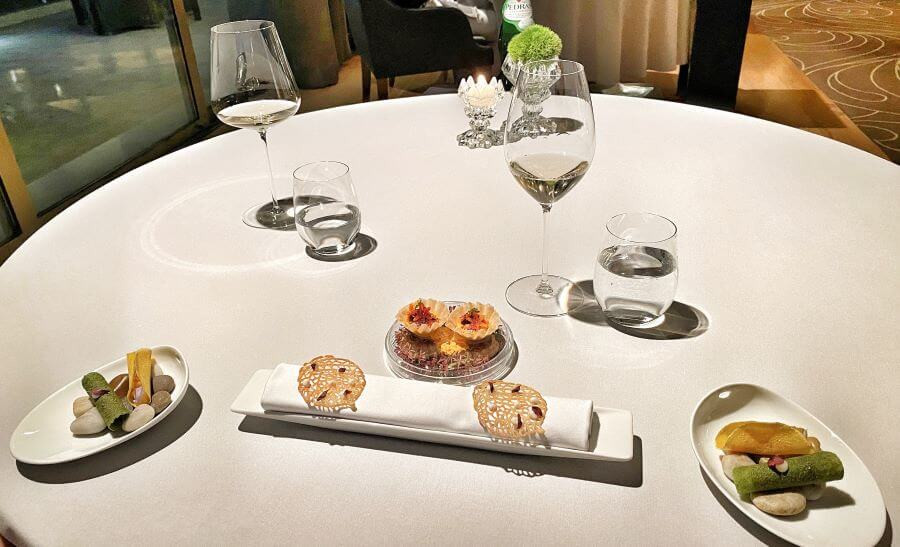 Table setting with amuses-bouches at Gusto by Heinz Beck, Portugal
