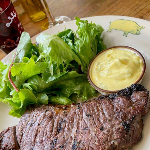 Steak and bearnaise sauce main course at the Pig restaurant Brockenhurst
