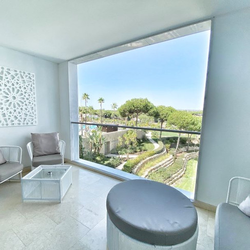 Pool view from a King Deluxe bedroom at Conrad Algarve