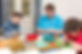 Two caretakers with a mentally disabled woman making a Ergotherapy.jpg