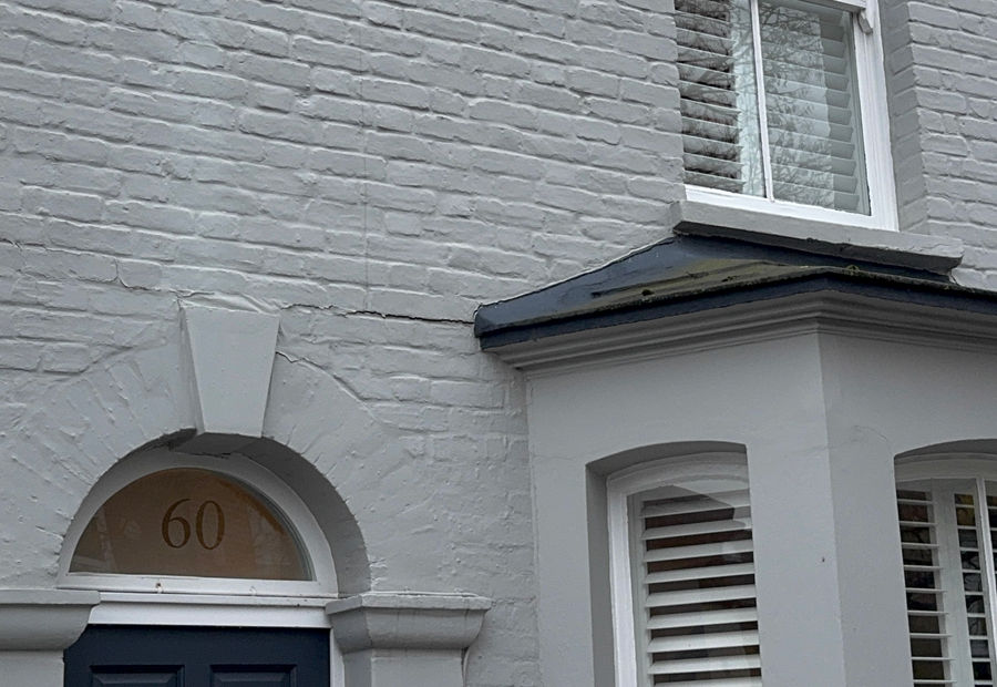 Bay-fronted London house with a painted brick front