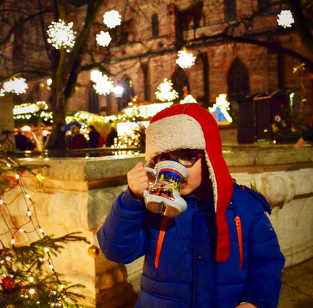 Family at Basel Christmas market medieval streets festive lights Switzerland winter