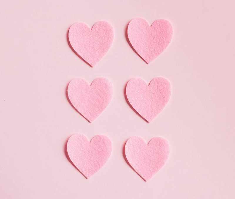 pink heart shaped on pink surface