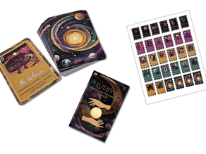 Lunar tarot set with cosmic designs. Includes cards, a booklet labeled "LUDIVA: Original Lunar Divination Cards Booklet" and a sheet of colorful stamps.
