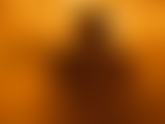 Spooky figure with glowing eyes stands ominously among silhouettes, set against a fiery orange backdrop, creating an eerie mood.