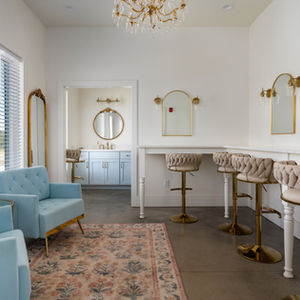 bridal suite with getting ready area in white barn wedding venue