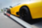 luxury car on flatbed