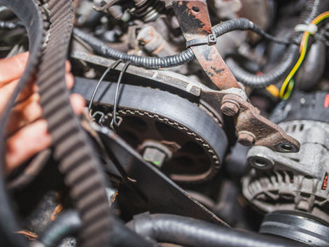 timing belt being inspected