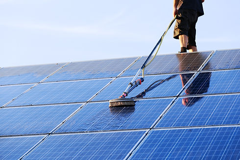 solar panel being cleaned