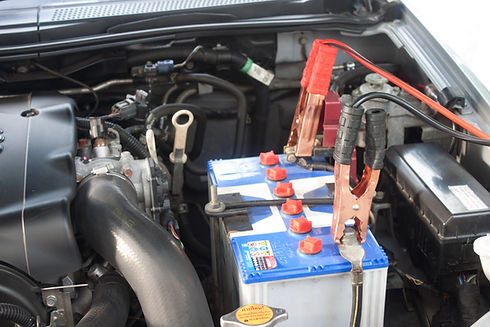 car battery being jumped