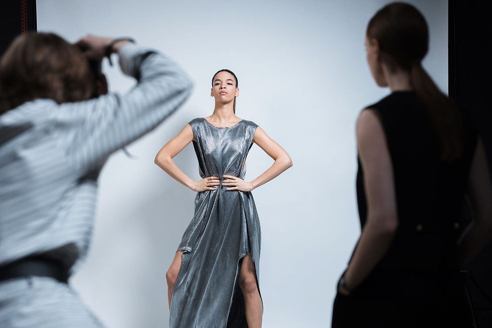 Models present dramatic couture gowns during Paris Haute Couture runway show, featuring intricate embroidery, sculptural silhouettes, luxurious fabrics, and handcrafted detailing that showcase the latest luxury fashion trends.