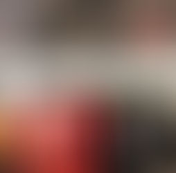 Fashion tradeshow showroom with apparel racks and clothing collections displayed for wholesale buyers