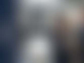 Sales representative using tradeshow order management software on a tablet to confirm a fashion buyer order on the exhibition floor at a B2B fashion tradeshow demonstrating how fashion exhibition order software and tradeshow sales automation help apparel brands convert leads into confirmed orders in real time