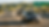 A car driving on the I-580 West freeway in Dublin CA with a cracked windshield from a construction truck, featuring a highway sign for Dublin Oakland and the Tri-Valley foothills.