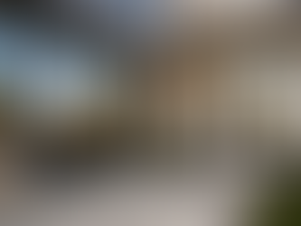 Modern commercial storefront and residential front entry with large glass windows and doors, representing security window film protection for homes and businesses in Dublin, CA.