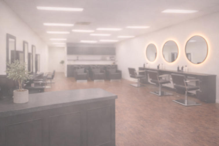 Modern salon with soft lighting.png