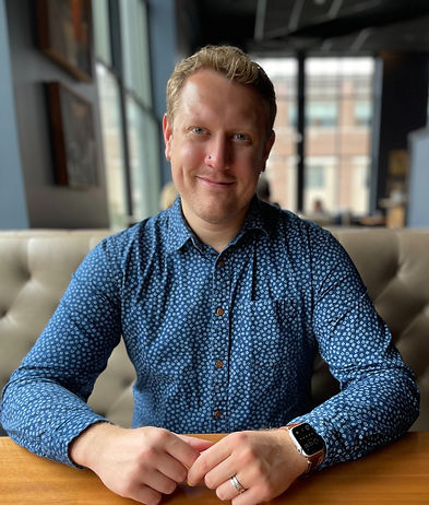 Jeff Maliskey wearing a blue and white patterned shirt