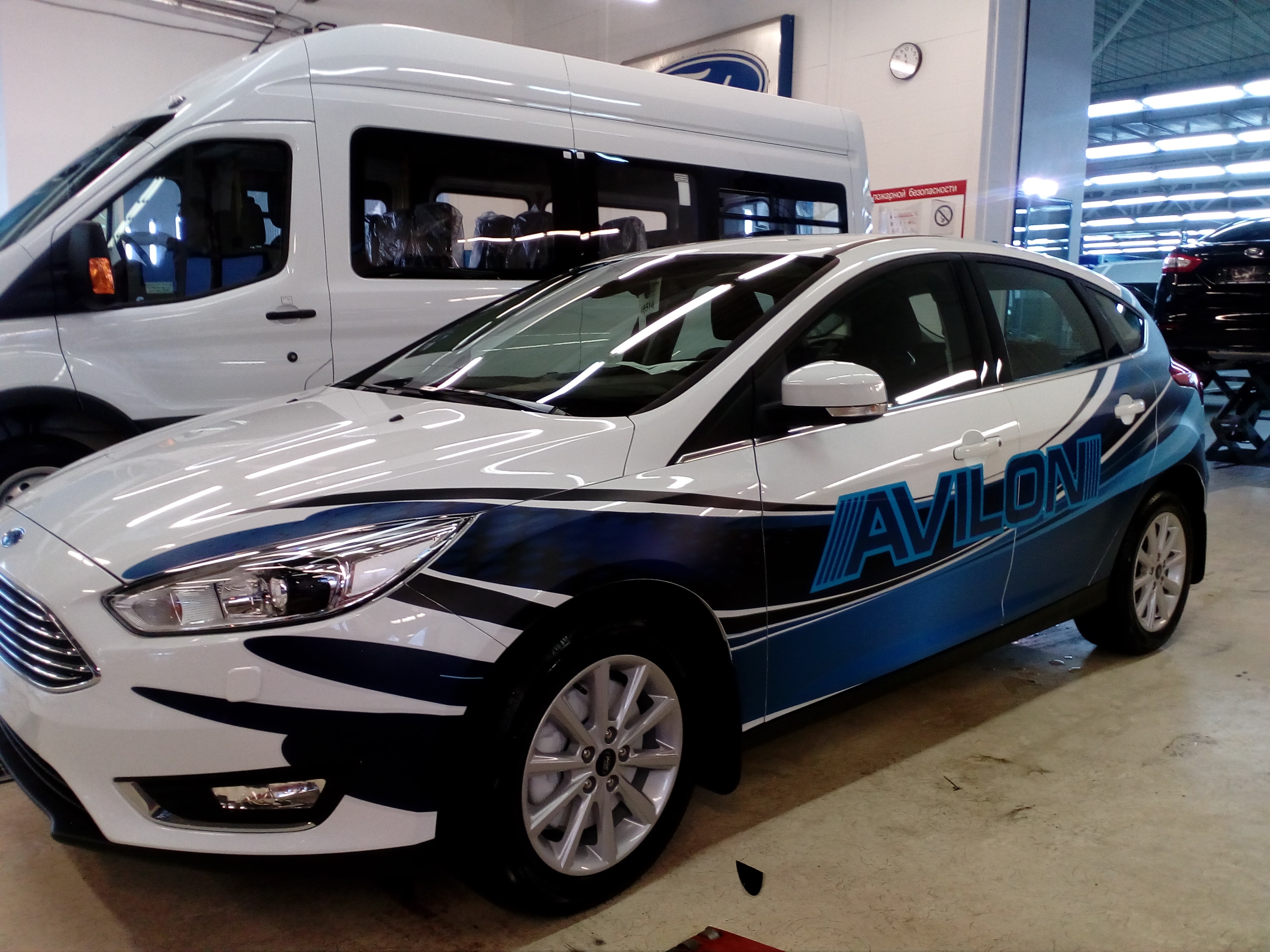 Рекламная оклейка автомобиля Ford Focus