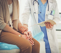 Doctor Holding Patient's Hand