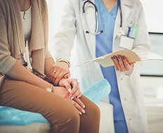 Doctor Holding Patient's Hand