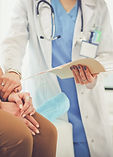 Doctor Holding Patient's Hand