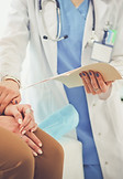 Doctor Holding Patient's Hand