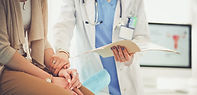Doctor Holding Patient's Hand