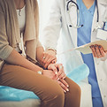 Médico com paciente