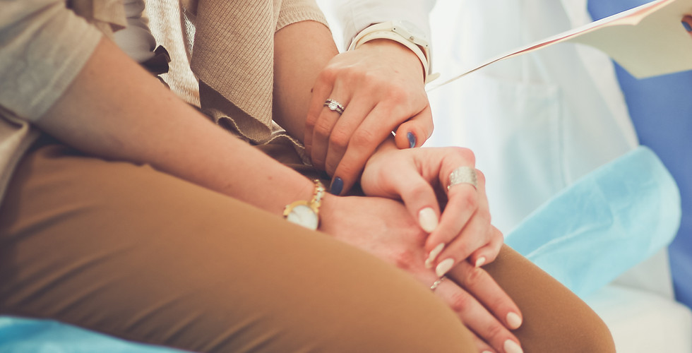 Doctor Holding Patient's Hand