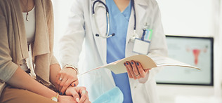 Doctor Holding Patient's Hand