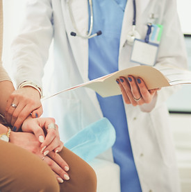 Doctor Holding Patient's Hand