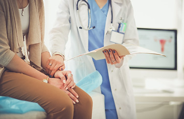 Doctor Holding Patient's Hand