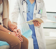 Doctor Holding Patient's Hand