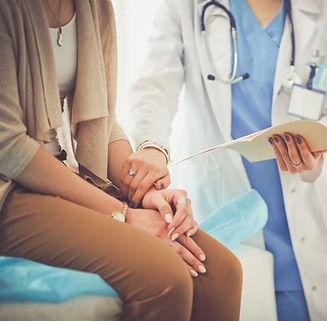 Doctor Holding Patient's Hand