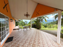 Covered outdoor living area beside Drogeda residence at Valli Hai Estate