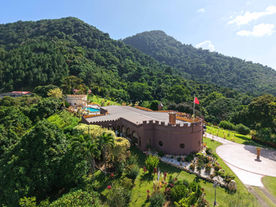 Shandelle Lauren residence nestled among mature trees at Valli Hai Estate