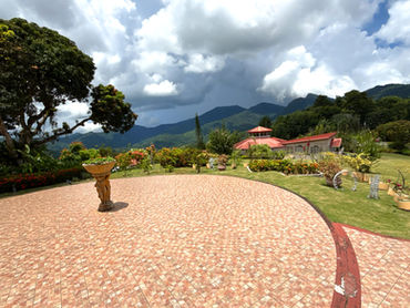 Circular paved courtyard at Shandelle Lauren overlooking the Northern Range