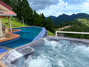 Landscaped lawn and panoramic Northern Range views from The White House
