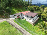 Aerial view of Cloud 9 residence and surrounding landscaped grounds