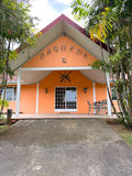 Front entrance of Drogeda residence with landscaped pathway and tropical plants