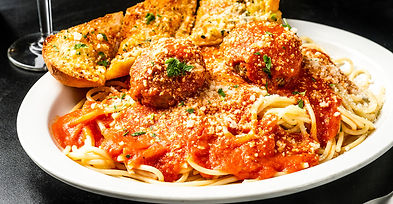 Displayed image of our the sunset tavern's pasta and pizza dish.