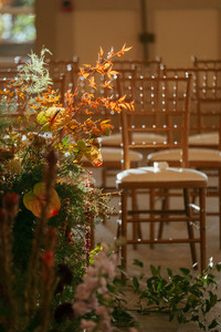 Wedding ceremony floral arrangement detail in upscale NJ ballroom venue