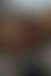 Couple having fun at Conservatory Garden Central Park engagement photos