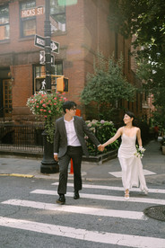 Bride and groom walking through Brooklyn Heights brownstone streets after Brooklyn City Hall elopement, documentary elopement photographer NYC